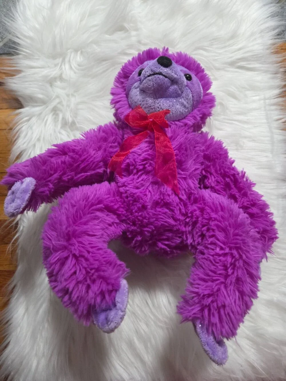 Purple Stuffed Sloth Toy
